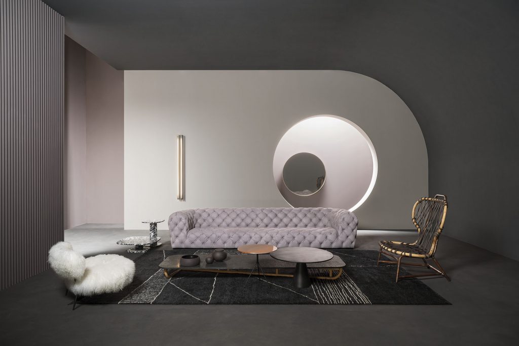 Berbère Dark Grey + Natural | Pattern A. Rug decorated with a woolen stitching in a living room.