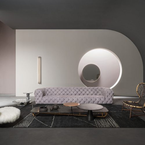 Berbère Dark Grey + Natural | Pattern A. Rug decorated with a woolen stitching in a living room.
