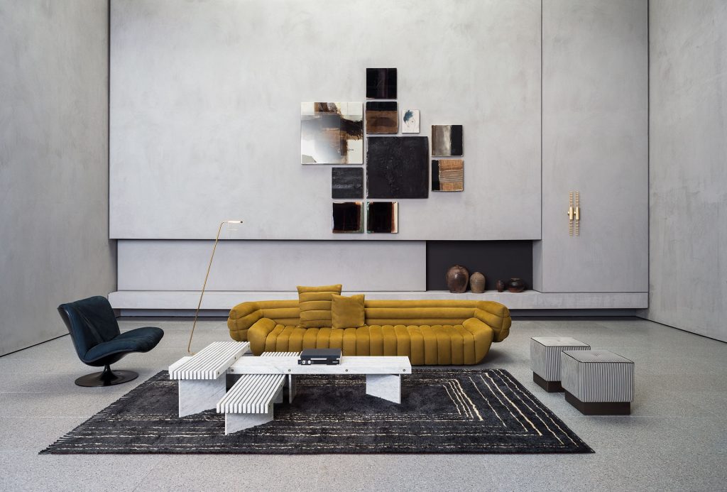 Berbère Dark Grey + Natural | Pattern B. Rug decorated with a woolen stitching in a living room.