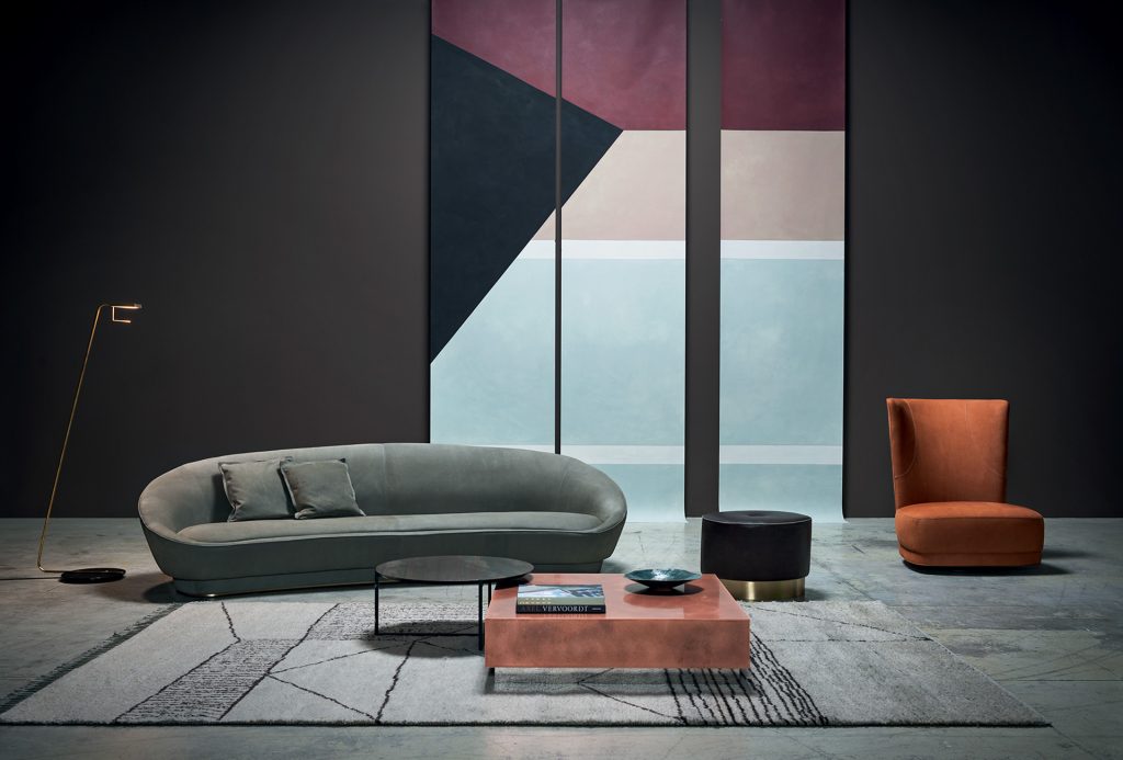 Berbère Light Grey + Dark Brown | Pattern A. Rug decorated with a woolen stitching in a living room.