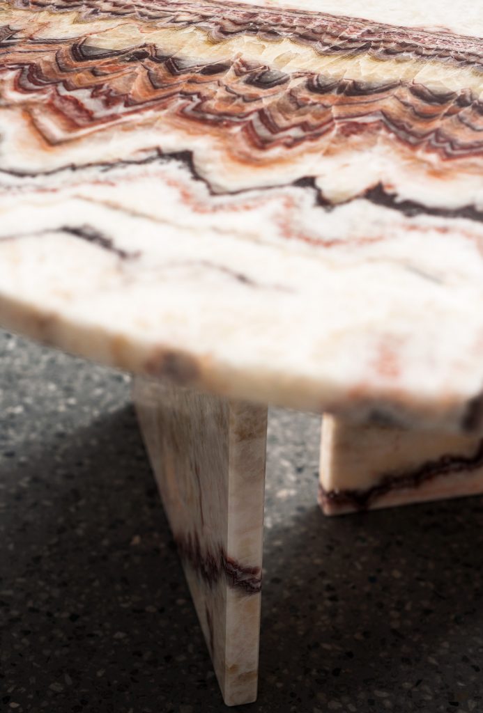 Gradient brown marble table with imperfect and elegant bases