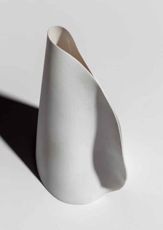 Twenty One lamp made of porcelain, blown borosilicate glass brushed white powder coated canopy on a white background.