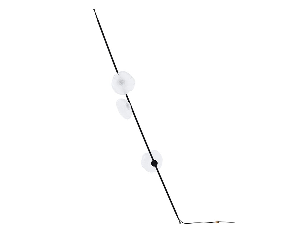 Boc Stem Column Floor Light in matte black finish with translucent white globes. Its minimal, architectural stance brings a soft ambient glow to sleek, modern environments.
