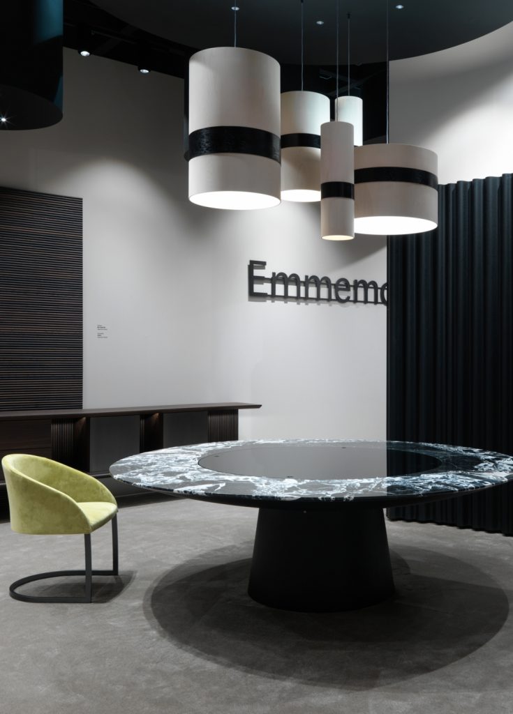 decorative panel in the form of horizontal lines made of a wooden base in a black colour tone in a living room