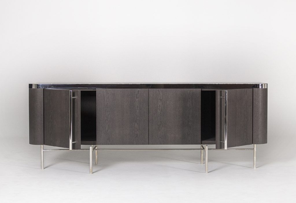 storage furniture made of a wooden base and transparent glass top, steel legs on a white background