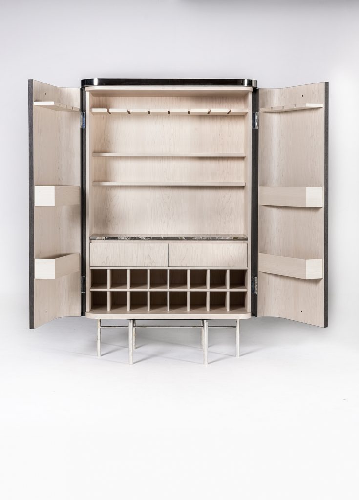 vertical furniture made of a wooden, glass and steel base with internal drawers on a white background
