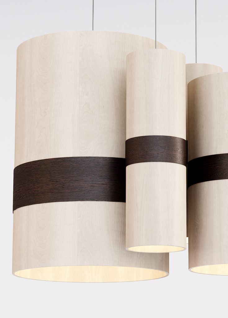 ceiling lamp made of wood in a brown and beige tone on a white background