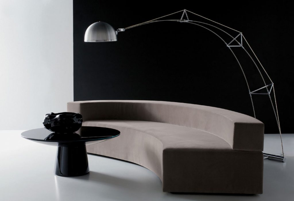 sofa made of beige fabric and wooden structure in a living room
