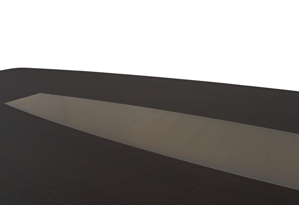 dining table made on a dark brown wooden base and brass detail in the middle on a white background