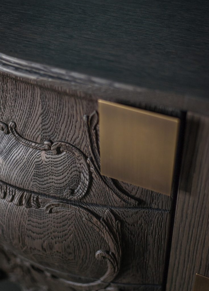 sideboard made on a black wooden base with a classic design