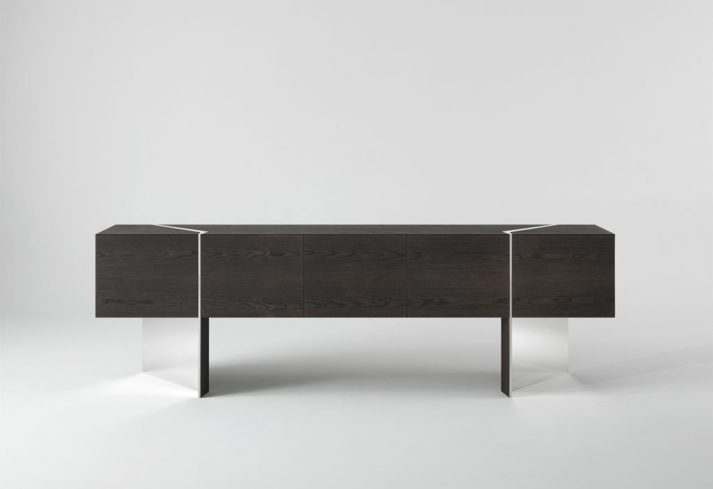 sideboard made of veneered plywood and a glass shelf made in a black colour on a white background