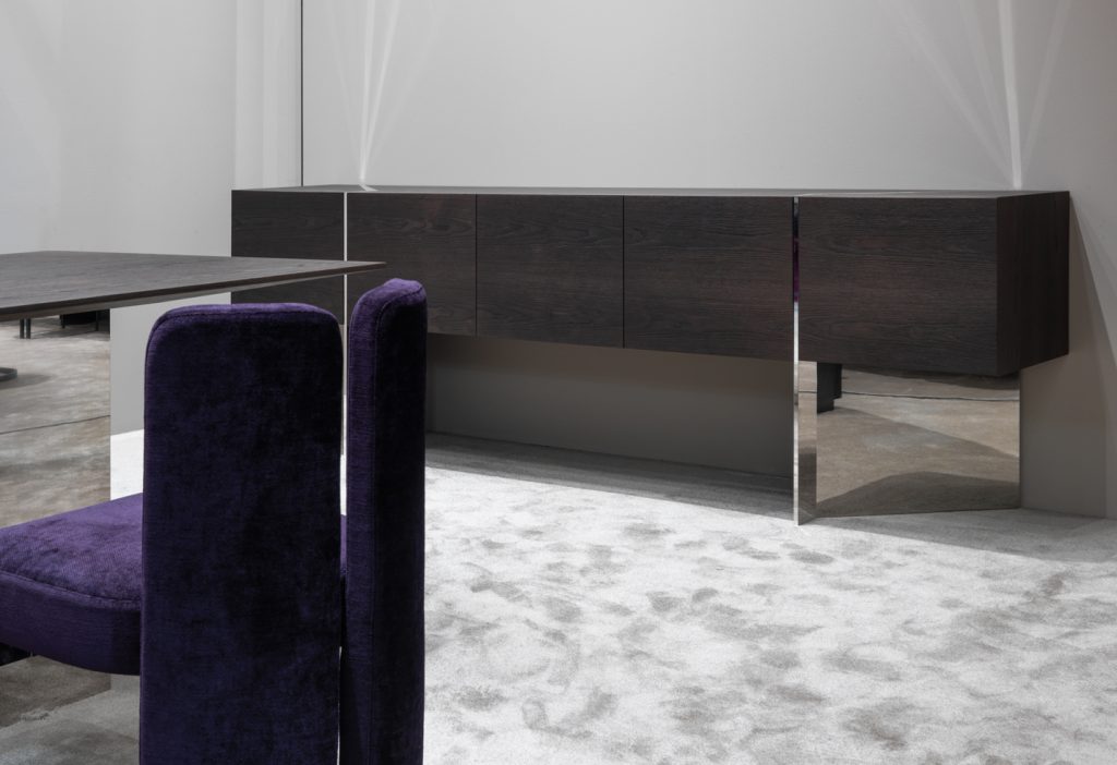 sideboard made of veneered plywood and a glass shelf made in a black colour
