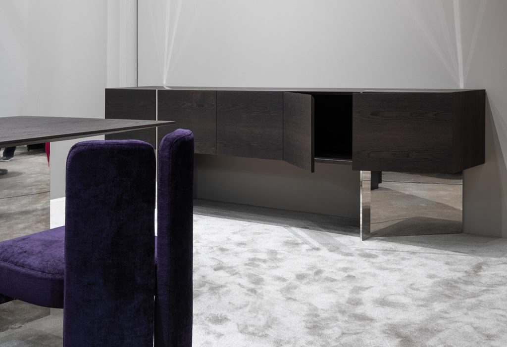 sideboard made of veneered plywood and a glass shelf made in a black colour
