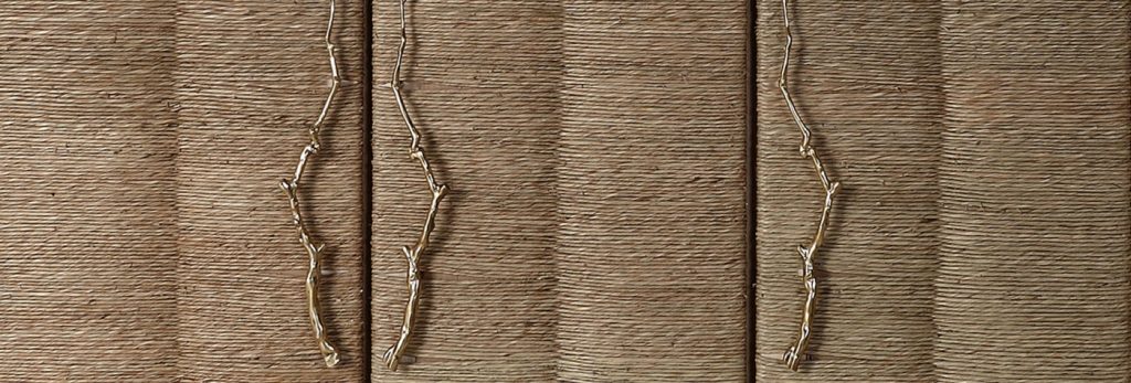 furniture covering made of straw in a beige tone on a white background