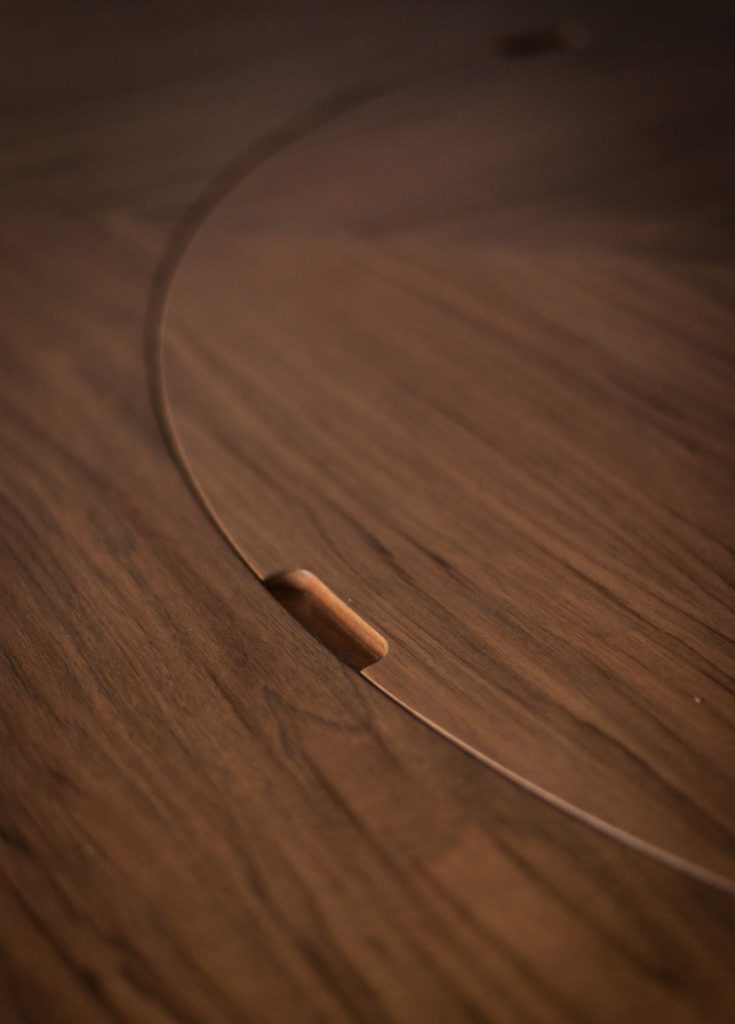 table top made of a wooden base in a flamed brown colour tone
