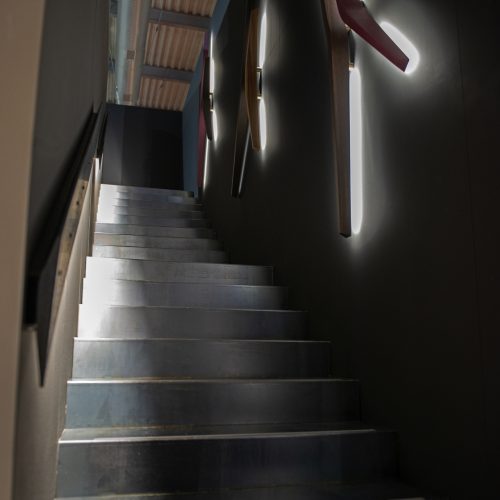 ceiling lamp made of a brass base in the shape of lines made in a bronze colour tone