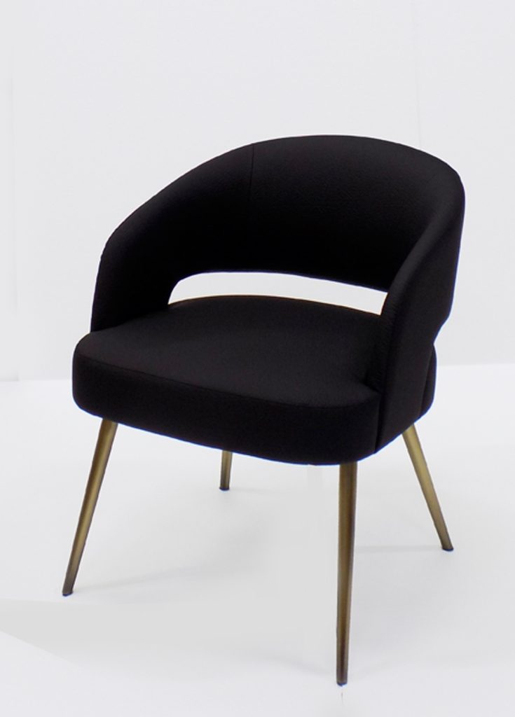 armchair made of a wood and metal base upholstered in leather in a black tone on a white background