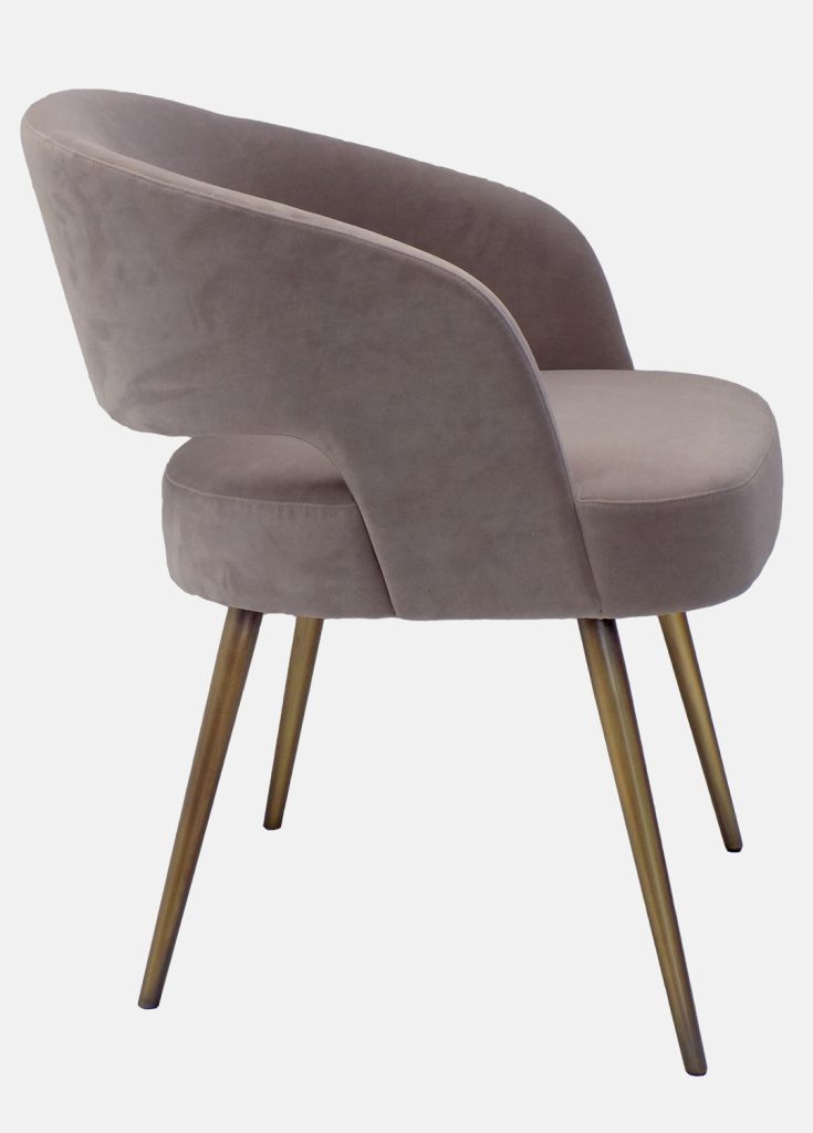 armchair made of a wood and metal base upholstered in leather in a beige tone on a white background