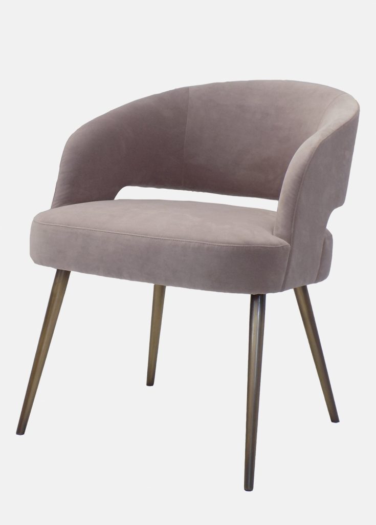 armchair made of a wood and metal base upholstered in leather in a beige tone on a white background