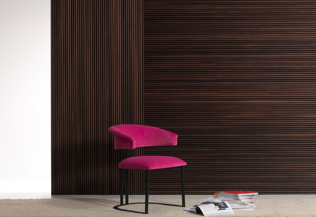 wall covering made of oak wood with a linear design in a dark brown tone with a chair in front