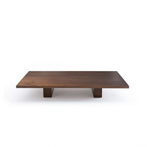 A compact studio shot of the Joint Rectangular Coffee Table showcasing its sleek wooden design broad surface and sturdy block-style legs