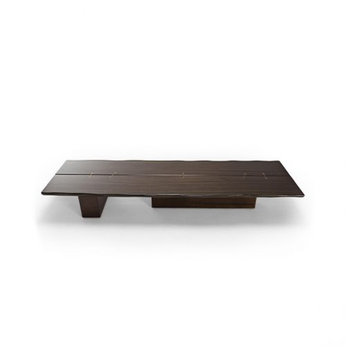 A 10th Joint Wood Coffee Table with a dark rectangular top and unique leg design is shown from a low angle against a white background