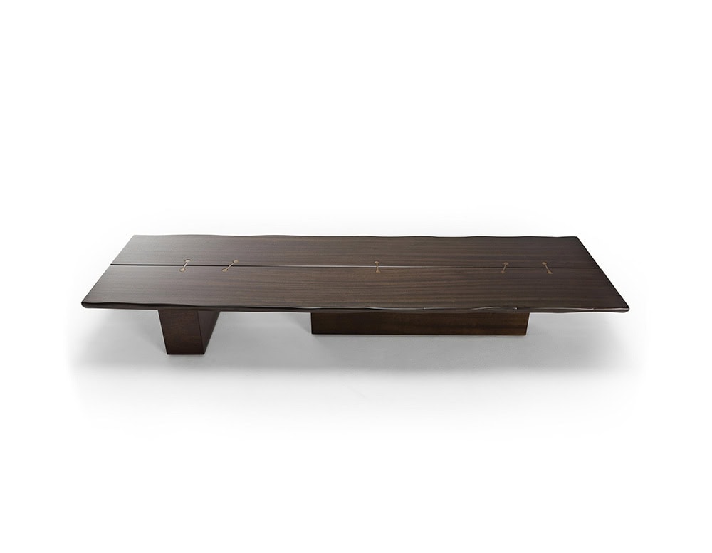 A 10th Joint Wood Coffee Table with a dark rectangular top and unique leg design is shown from a low angle against a white background