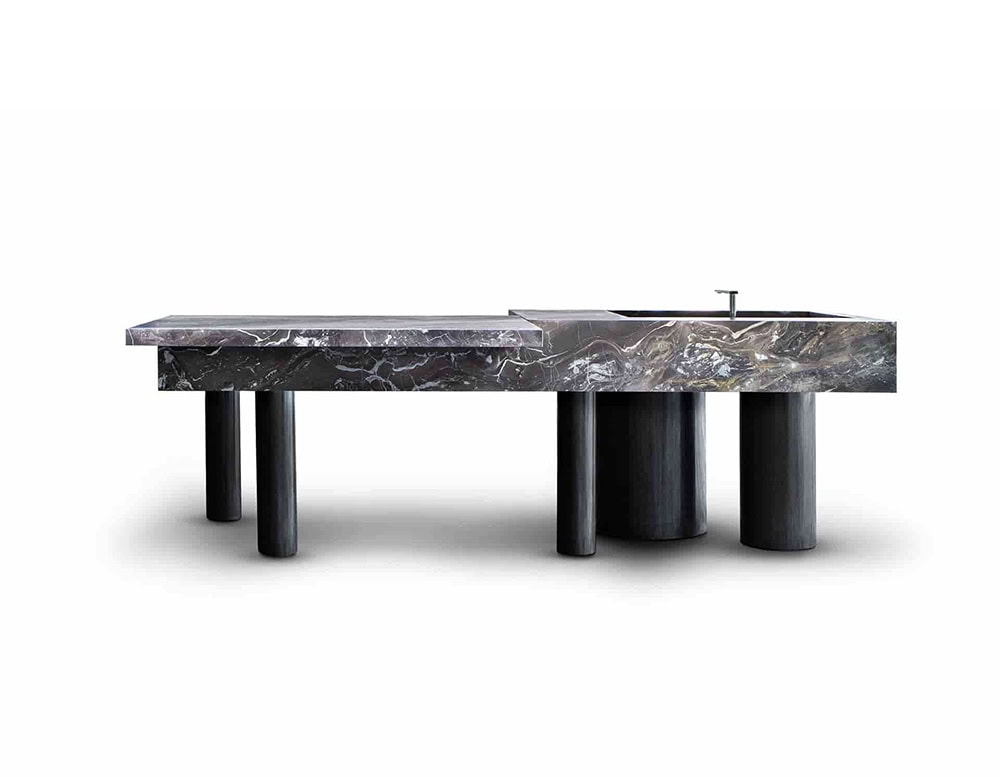 10th Outdoor Kitchen unit featuring a sleek black countertop and cabinet with matching black legs is shown against a white background; the unit includes open shelving and a closed cabinet with a door
