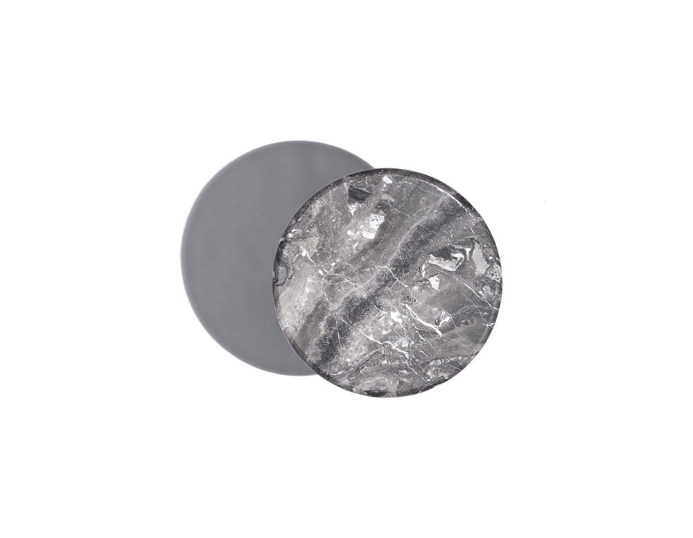 A 10th Star Outdoor Coffee Table Stool with a round, gray marble top and a dark metal base is shown against a white background