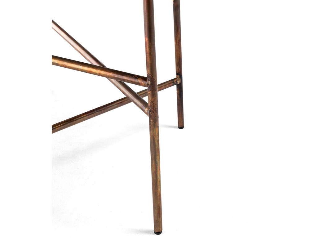A close-up of a 10th Star Outdoor Coffee Table Stool shows its dark metal base with a starburst design and four legs against a white background
