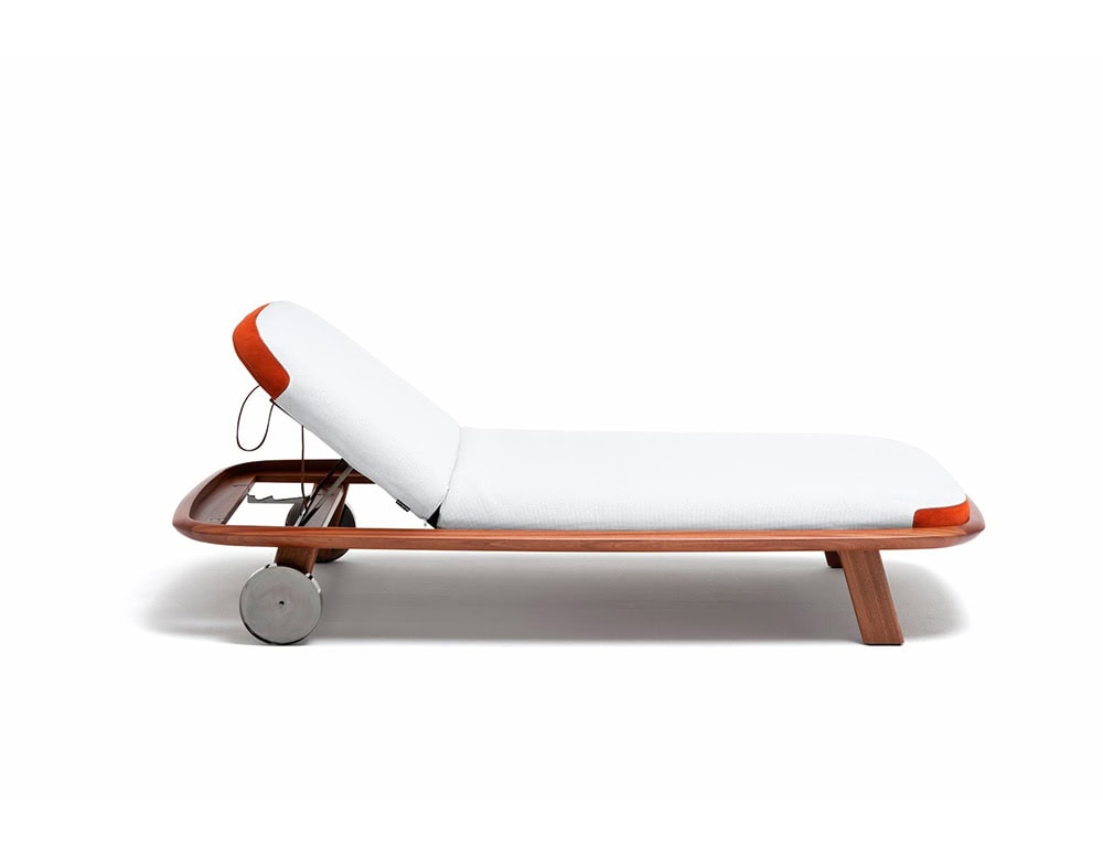 Profile view of the 10th Tellaro Sun Lounger with a white cushion, orange headrest, and light wood frame on a white background