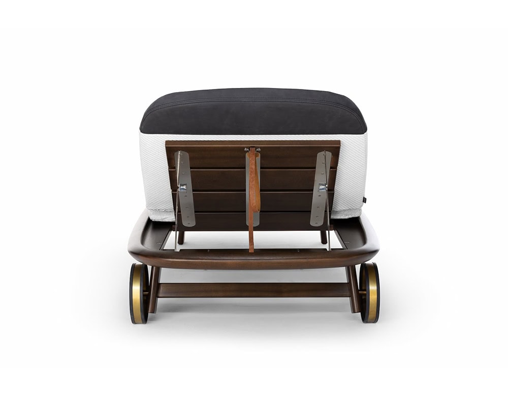 Rear view of the 10th Tellaro Sun Lounger, showing dark cushion, white frame, brown wood slats, and small wheels on a white background.