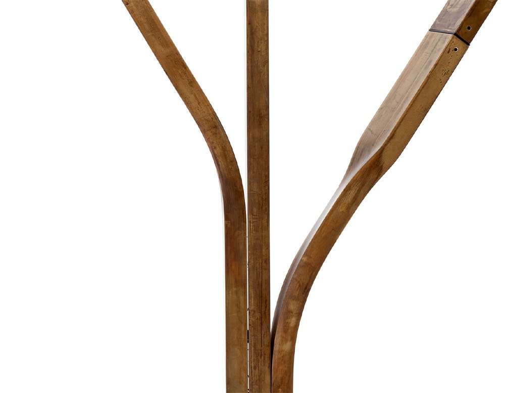 A detailed close-up of the 10th Tree Light Outdoor Floor Light showcasing its elegantly branching wooden frame with a smooth natural finish