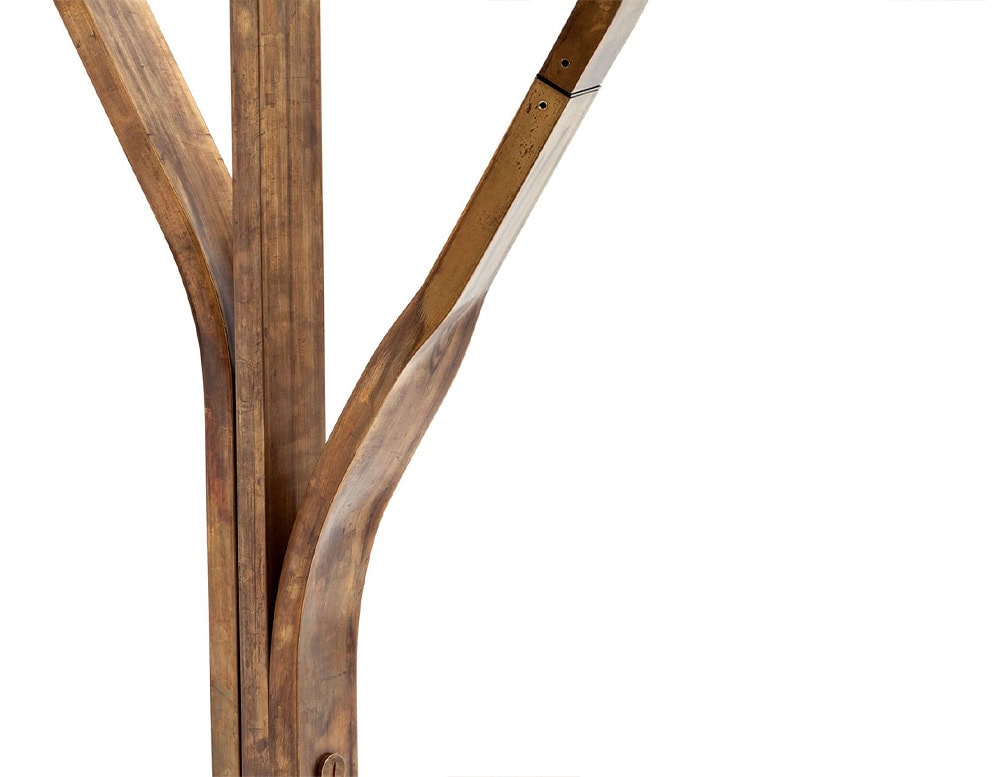 A detailed close-up of the 10th Tree Light Outdoor Floor Light showcasing its gracefully branched wooden frame with a smooth natural finish