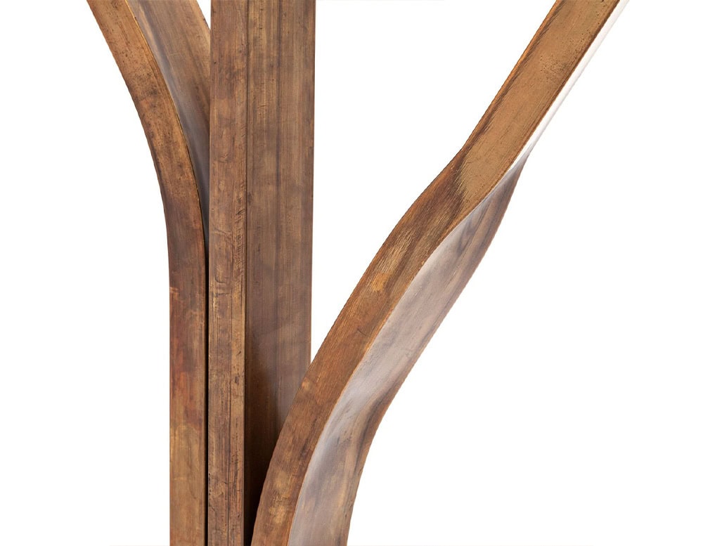 A close-up of a 10th Tree Light Outdoor Floor Light shows its slender, branching stem with a wood-like finish against a white background