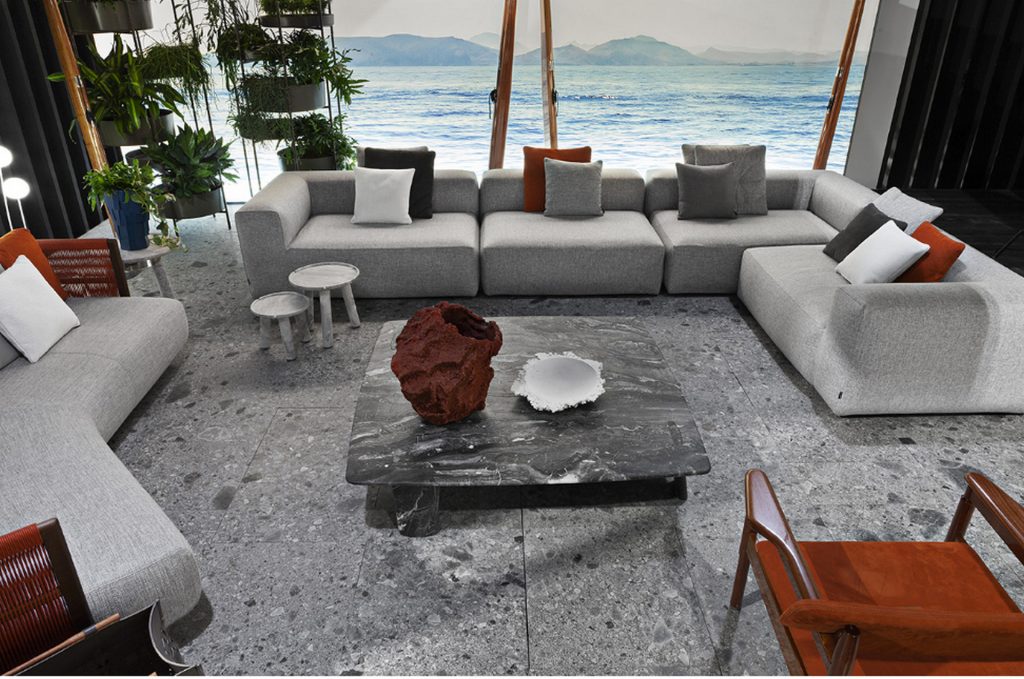 Rectangle Biscuit Coffee Table and short legs in white and gray marble in a living room.