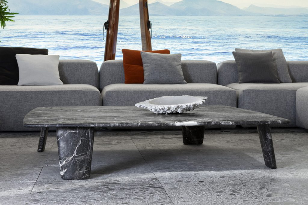 Rectangle Biscuit Coffee Table and short legs in white and gray marble in a living room.