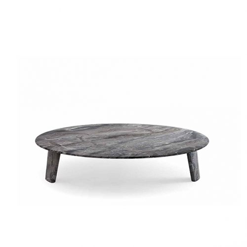 A Biscuit Outdoor Coffee Table with a round gray top and short, thick legs is shown against a white background