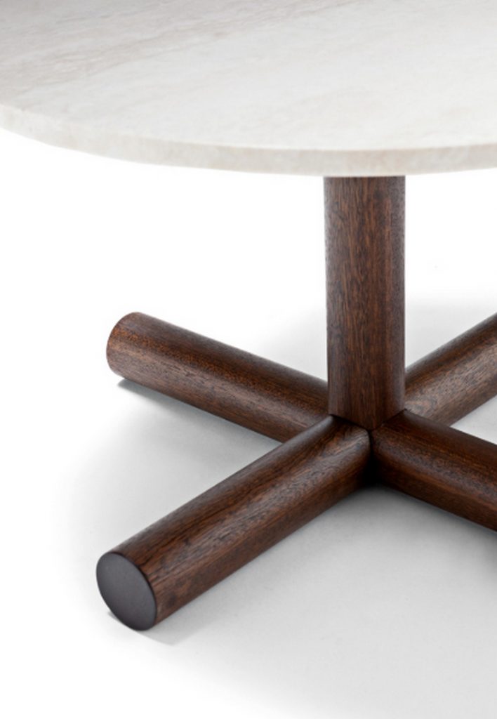 Helix Coffee Table: White round top and bronze central leg on a white background.