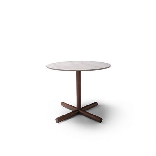 A Helix Outdoor Coffee Table with a round white top and a dark wood base with four legs is shown against a white background