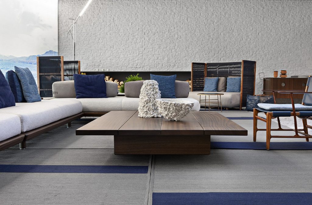 Brown Joint Rectangular Coffee Table: Rectangular top with two legs in a living room.