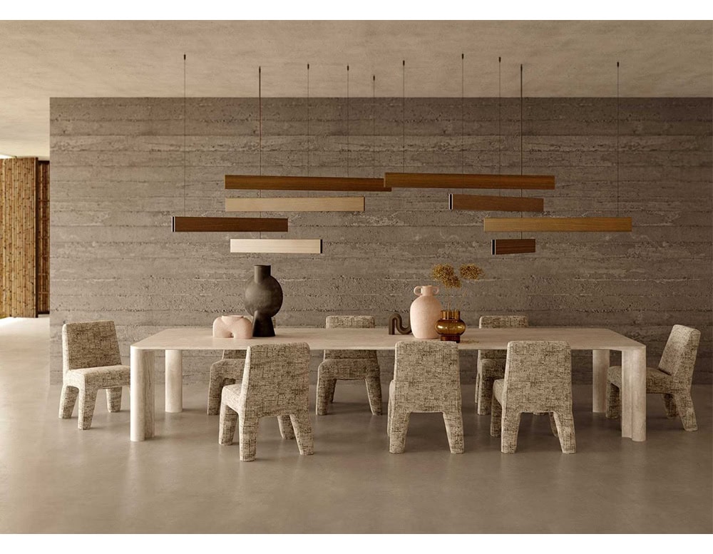 Michelangelo Dinner Table in rectangular shape. Top in white with gour gray legs in a dining room.