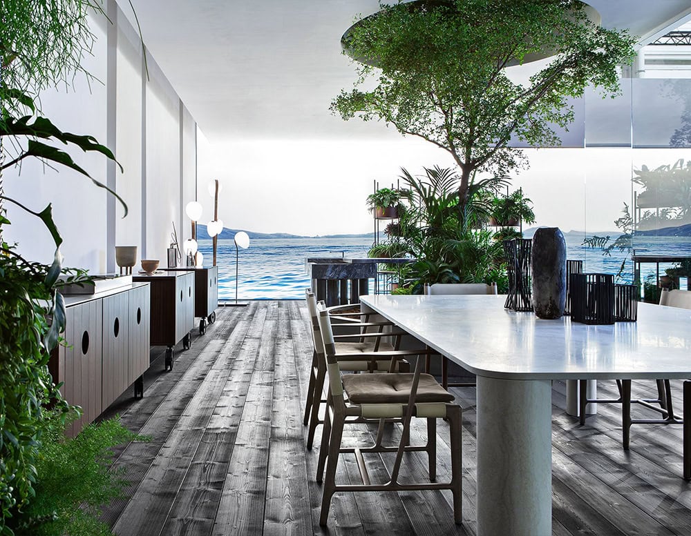 Michelangelo Dinner Table in rectangular shape. Top in white with gour gray legs in a dining room.