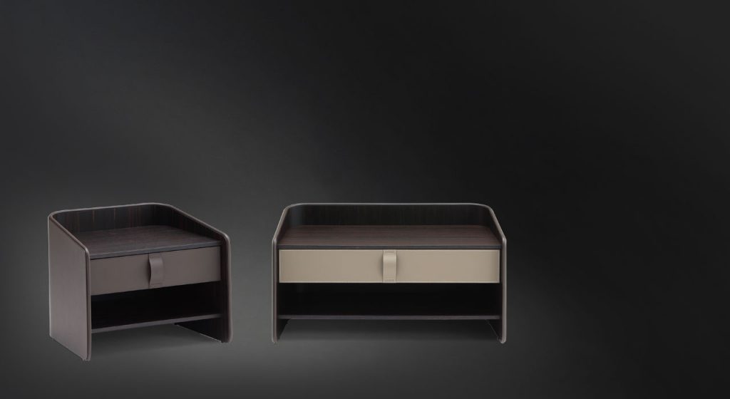 Two Gentleman Night Tables. Curved structure natural wood. Shelf one in beige and one in brown on a black background.