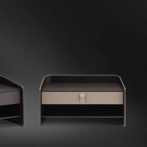 Two Gentleman Night Tables. Curved structure natural wood. Shelf one in beige and one in brown on a black background.