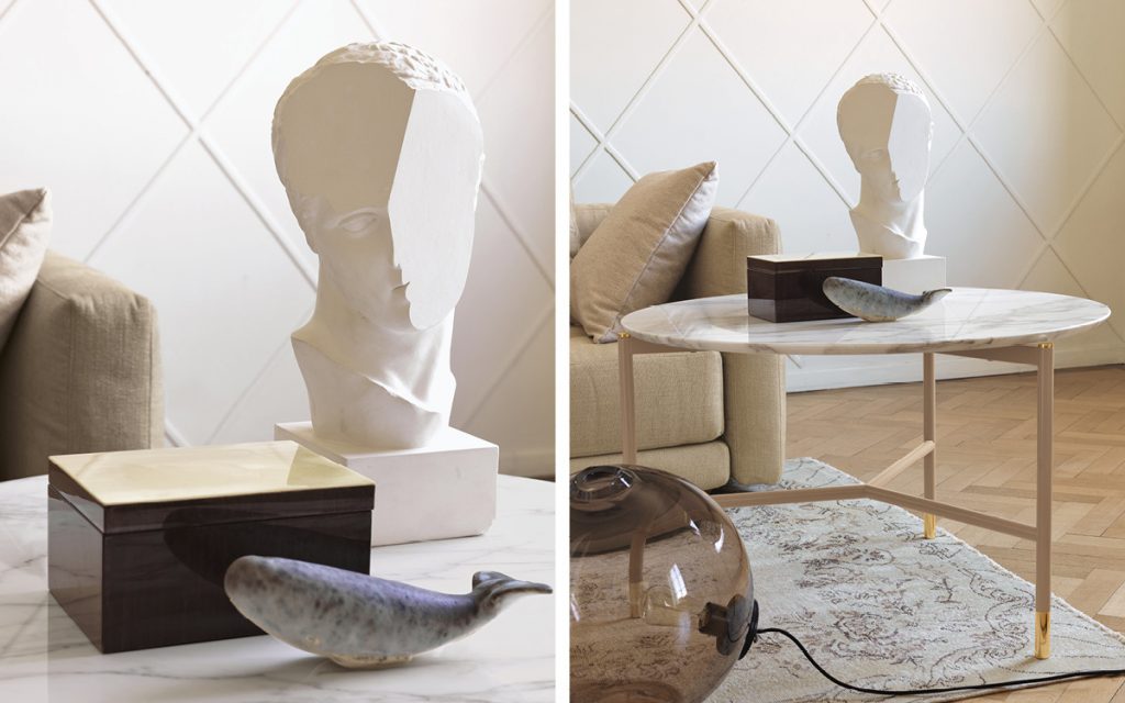 Closeup of Iko Side Table, top in brown marble with gold legs in a living room.