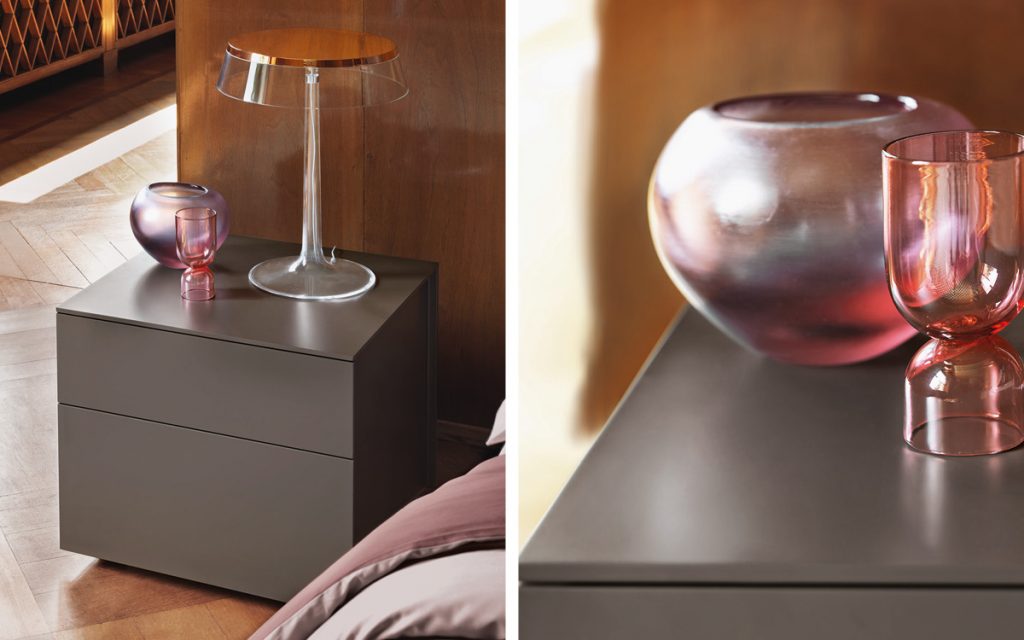 Closeup of Juta Dresser with two drawers in brown color in a room.