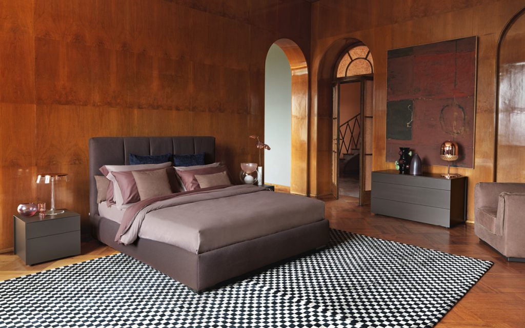 Juta Dresser with two drawers in brown color in a bedroom.