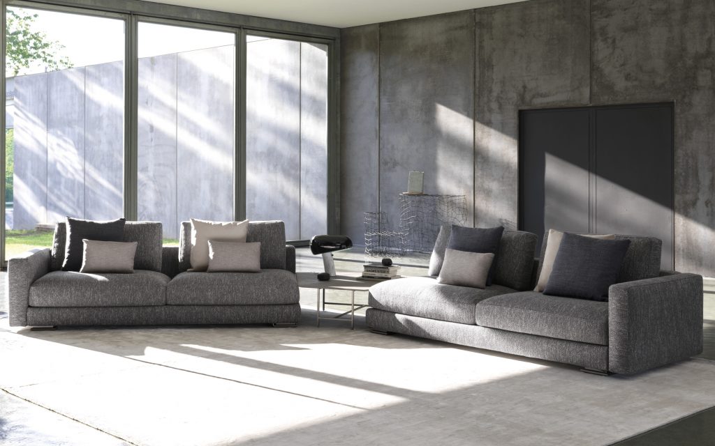 Myplace A: Gray sofa separated by a table, with two seats on each side in a living room.