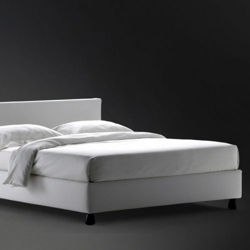 Notturno 2 Double bed. Base and backrest covered in gray fabric on a black background.